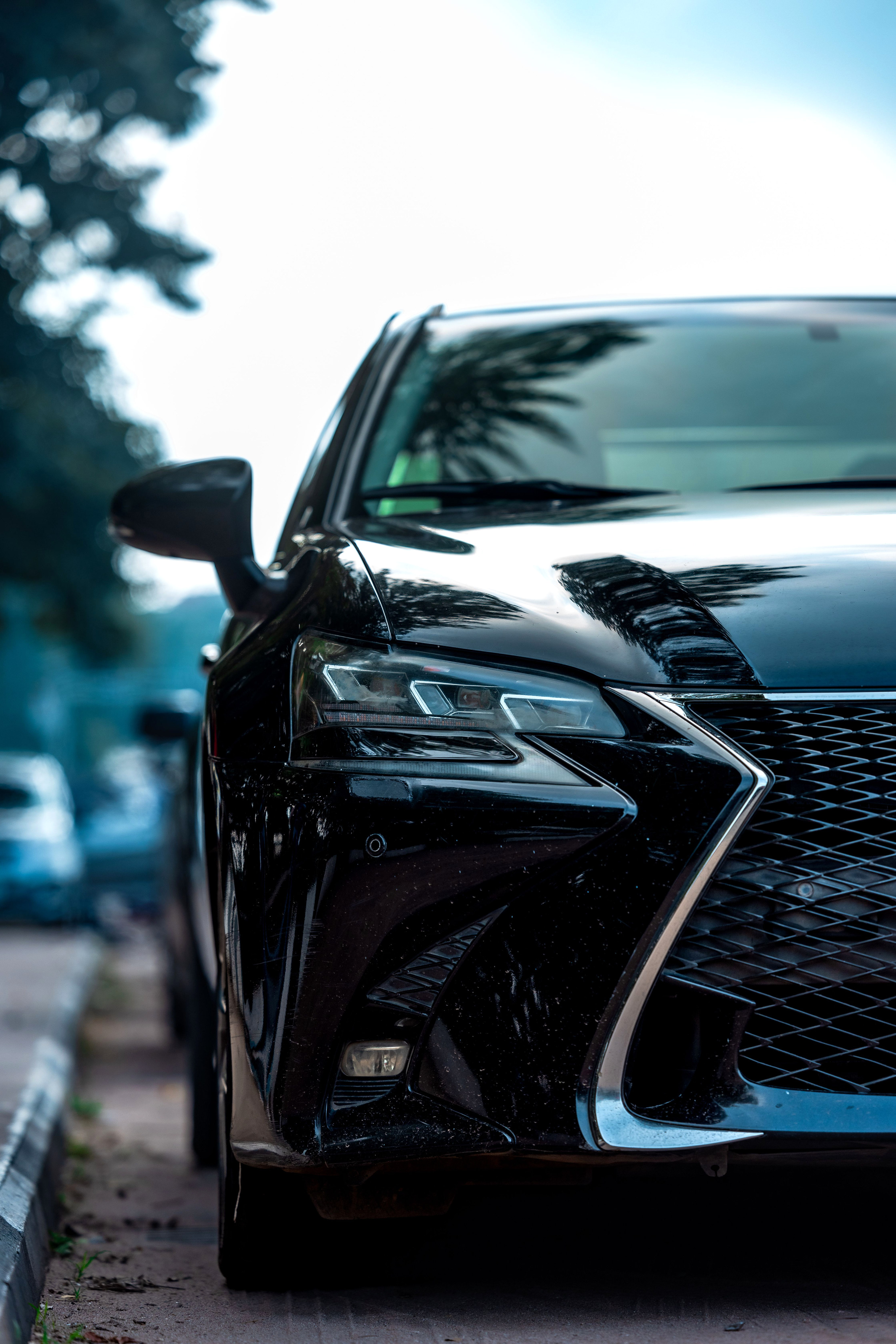 Black car photographed in Abuja, Nigeria; editorial vehicle photograph