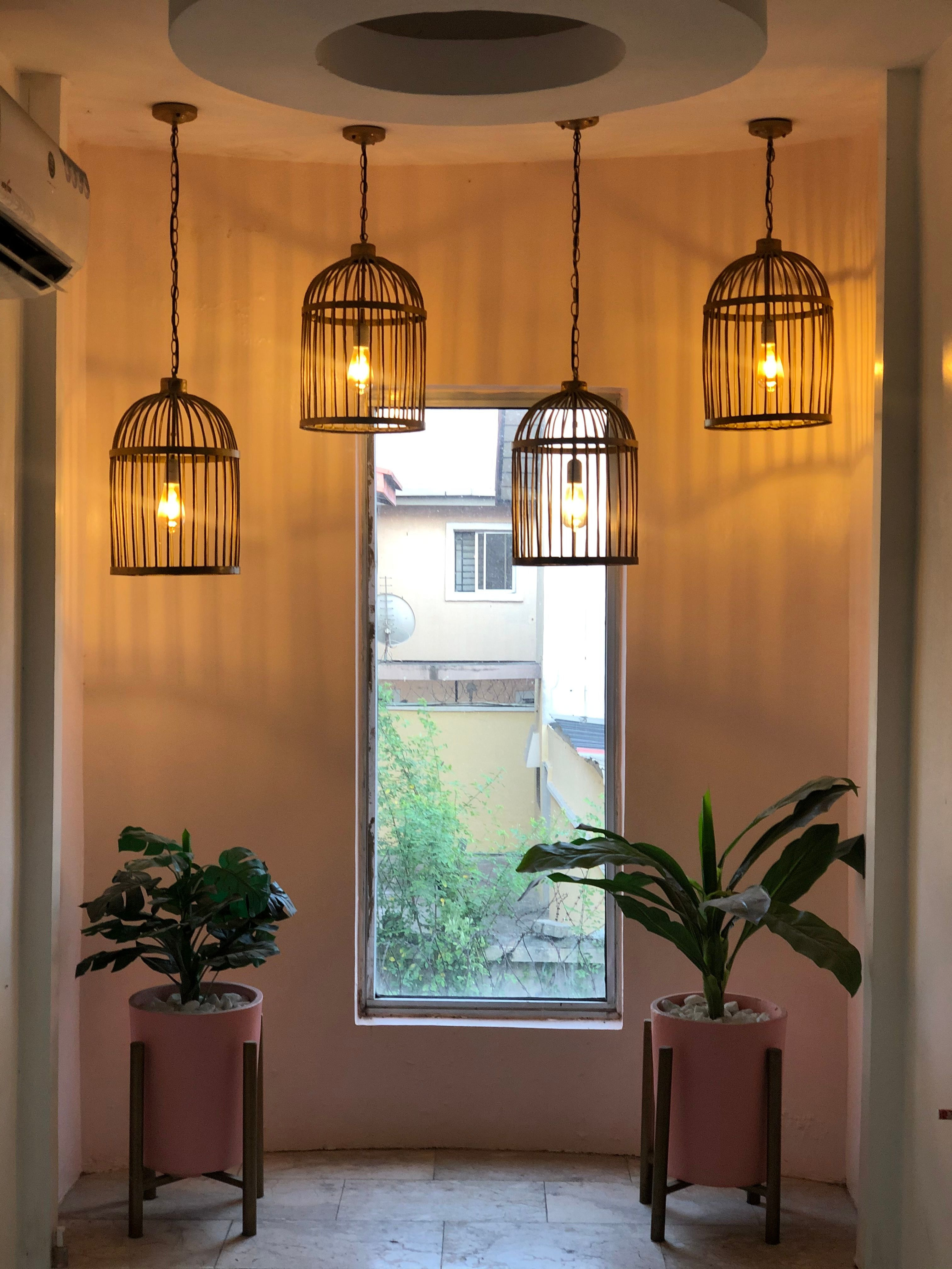 Warm pendant lighting in a Lekki, Lagos interior; editorial photograph